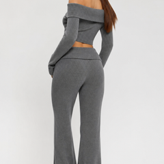 Grey two-piece off-shoulder knit top and flared trousers set