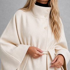 Cream wool-blend cape coat with high collar and tie belt