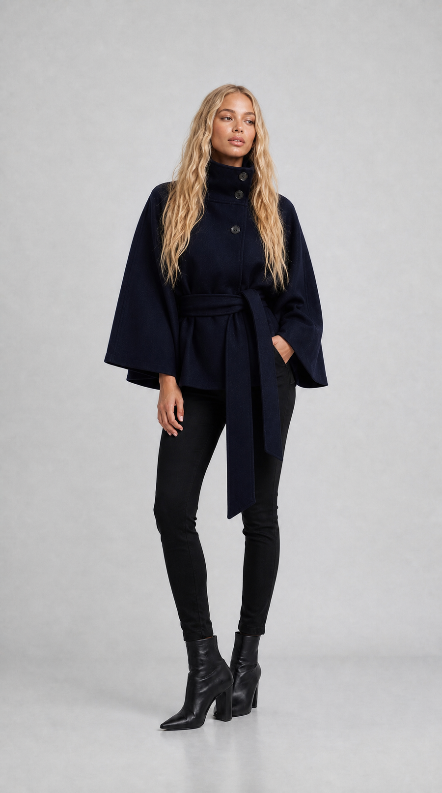 Navy wool-blend cape coat with high collar and tie belt