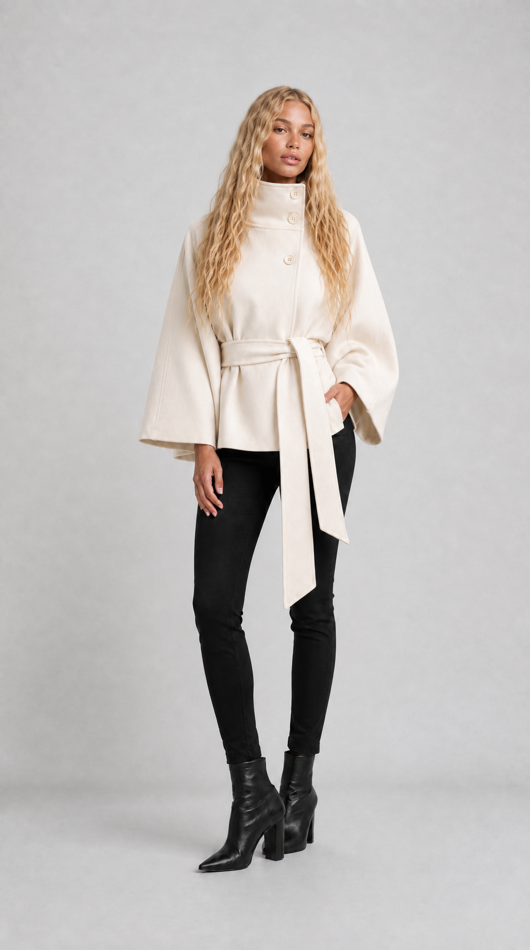 Cream wool-blend cape coat with high collar and tie belt