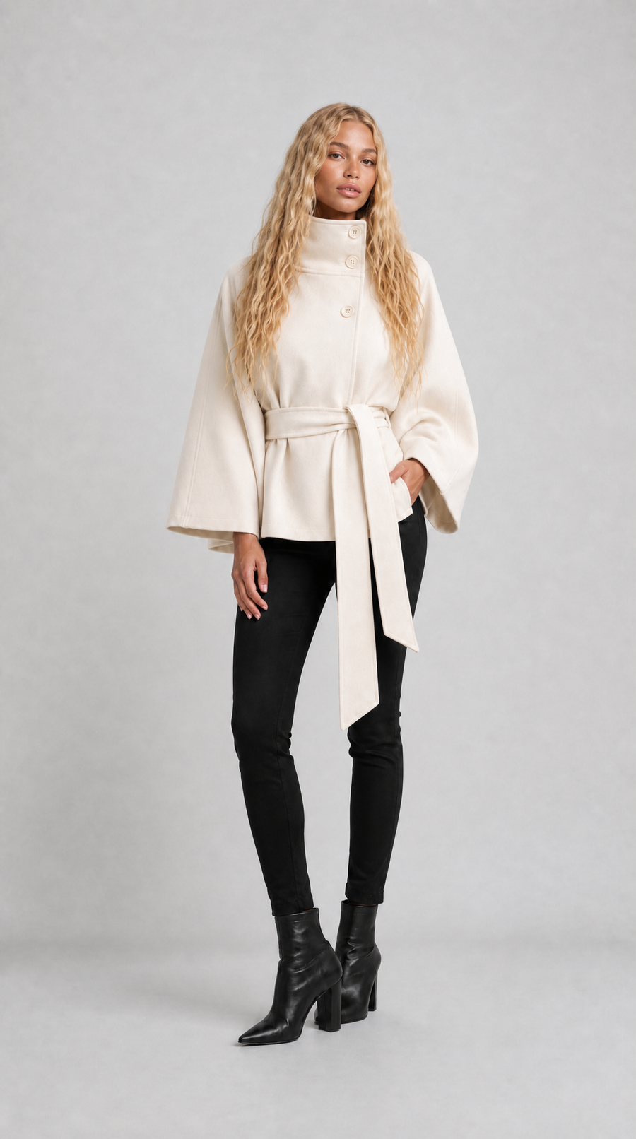 Cream wool-blend cape coat with high collar and tie belt