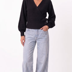 Black wrap blouse with balloon sleeves and side tie
