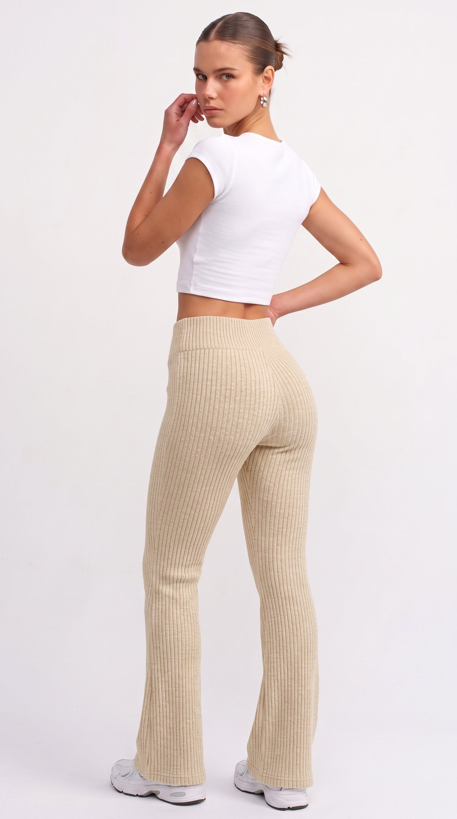 Cream ribbed knit flared trousers