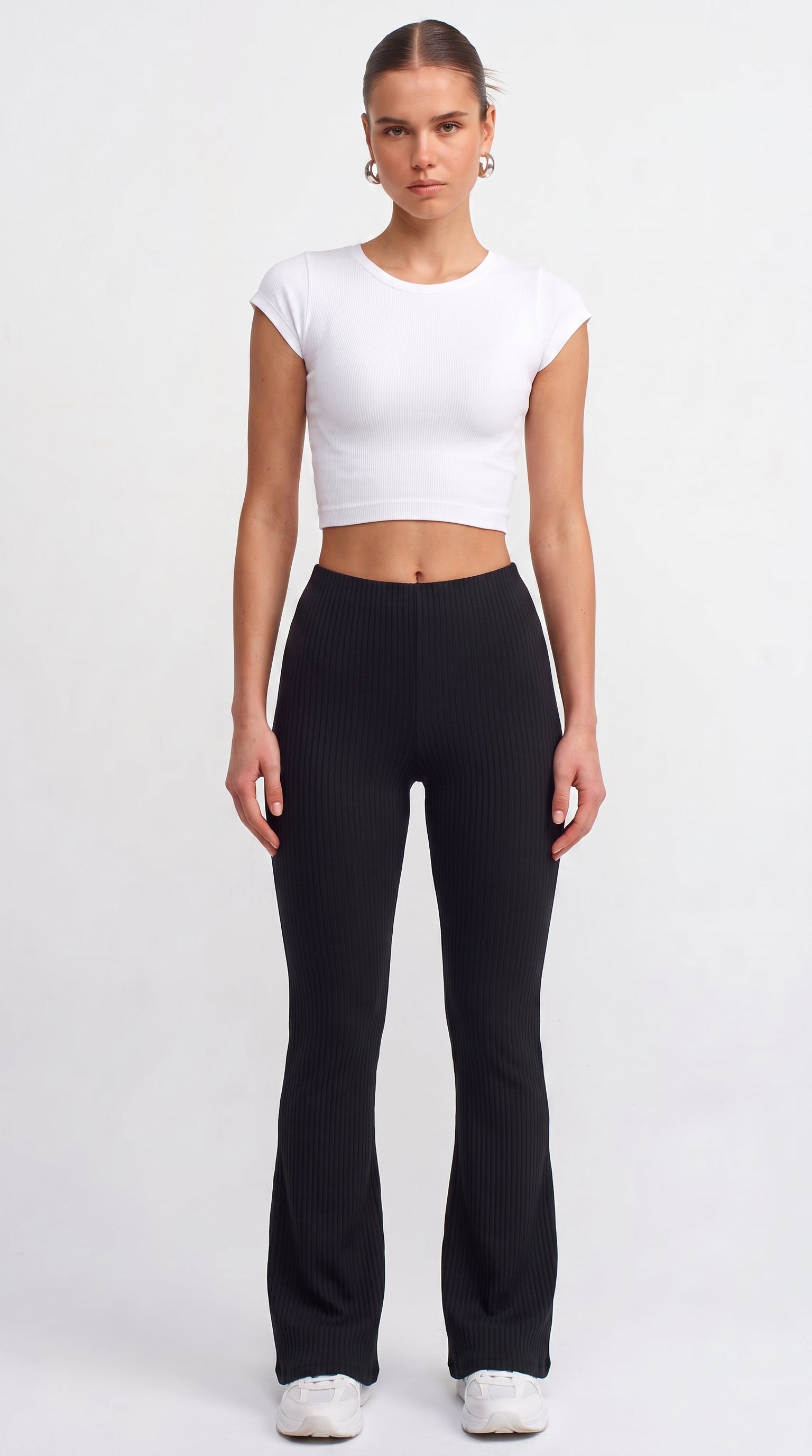 Black ribbed knit flared trousers
