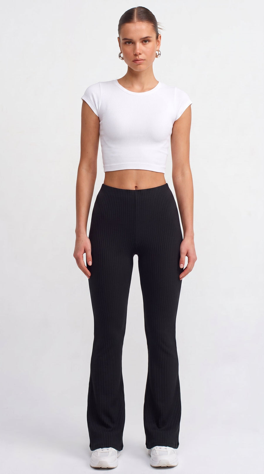 Black ribbed knit flared trousers