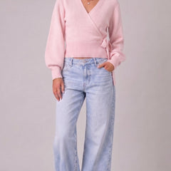 Pink wrap blouse with balloon sleeves and side tie