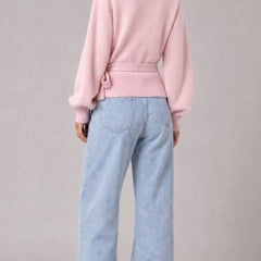 Pink wrap blouse with balloon sleeves and side tie