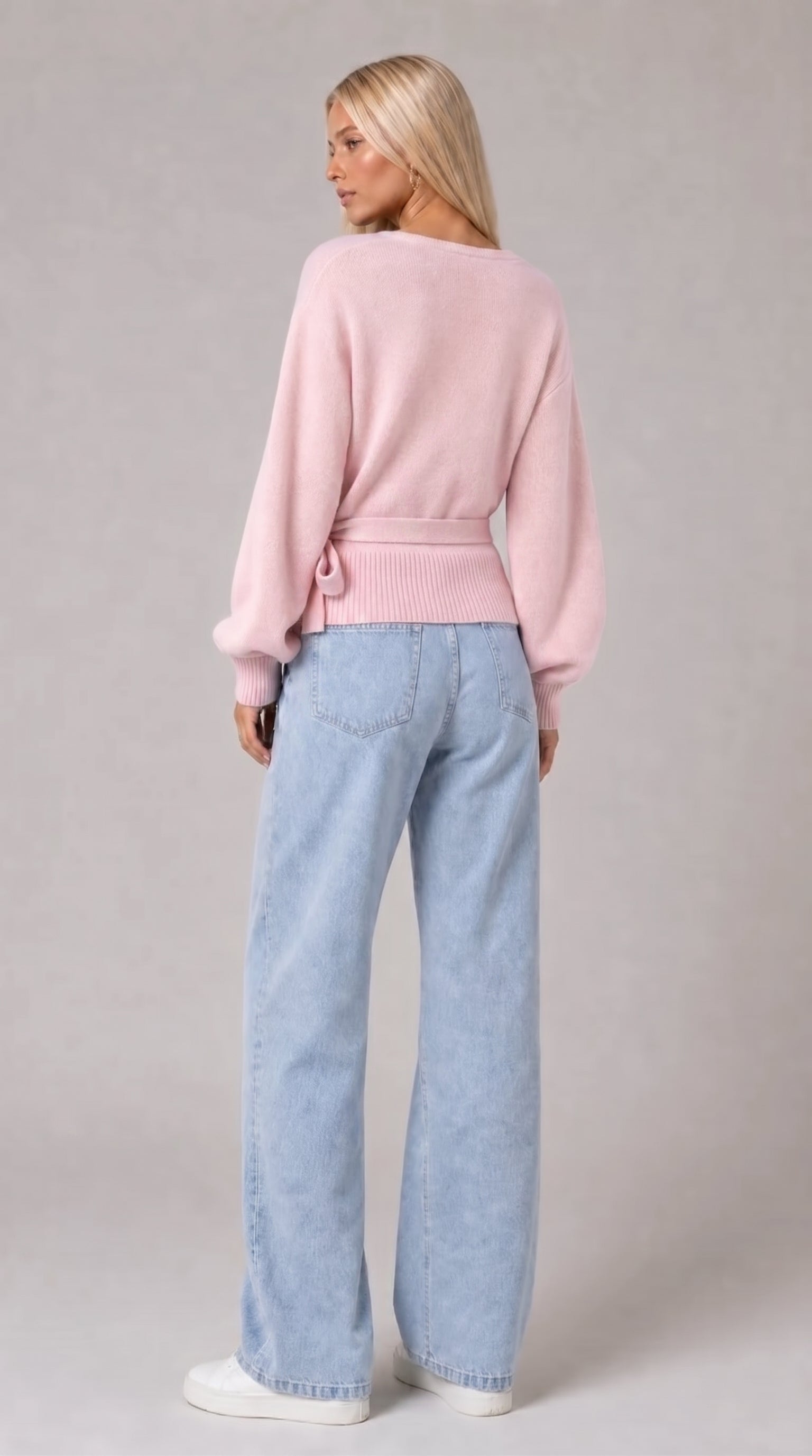 Pink wrap blouse with balloon sleeves and side tie