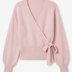 Pink wrap blouse with balloon sleeves and side tie