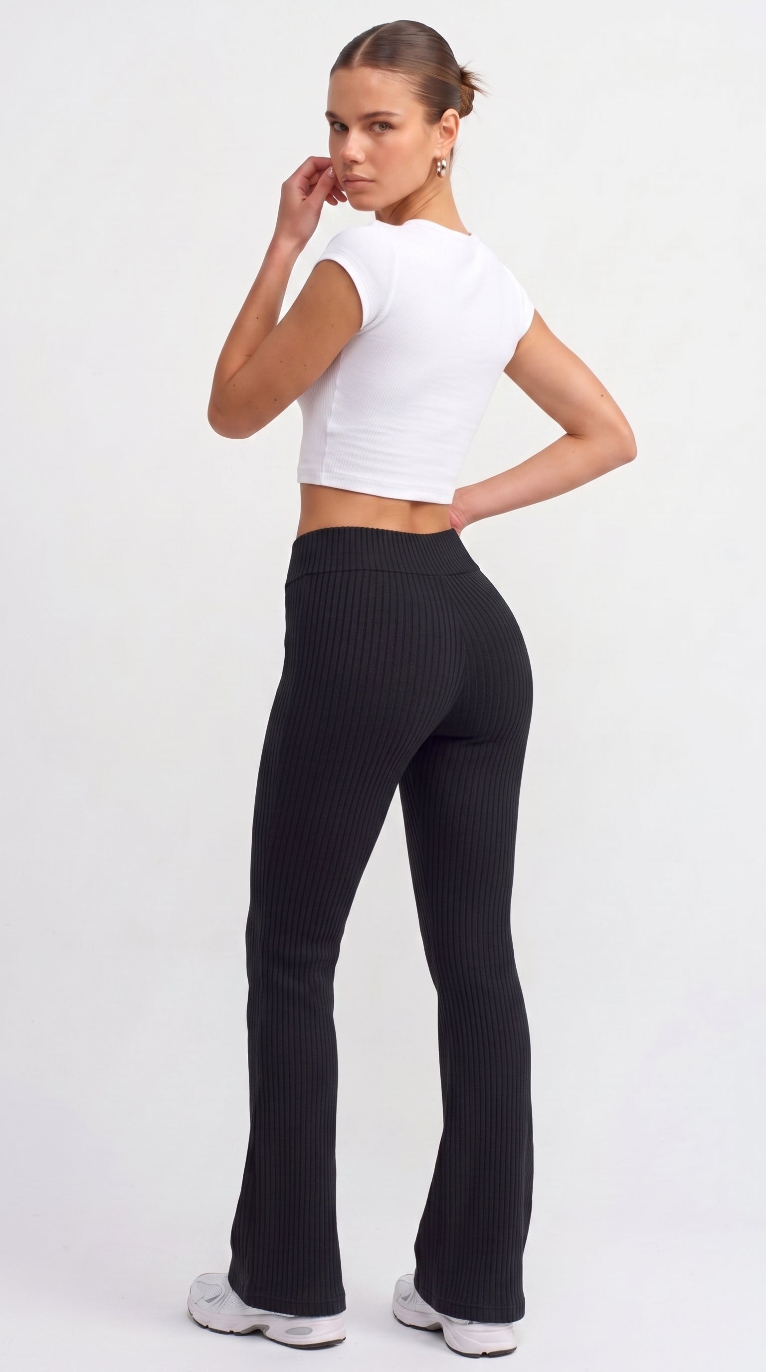 Black ribbed knit flared trousers
