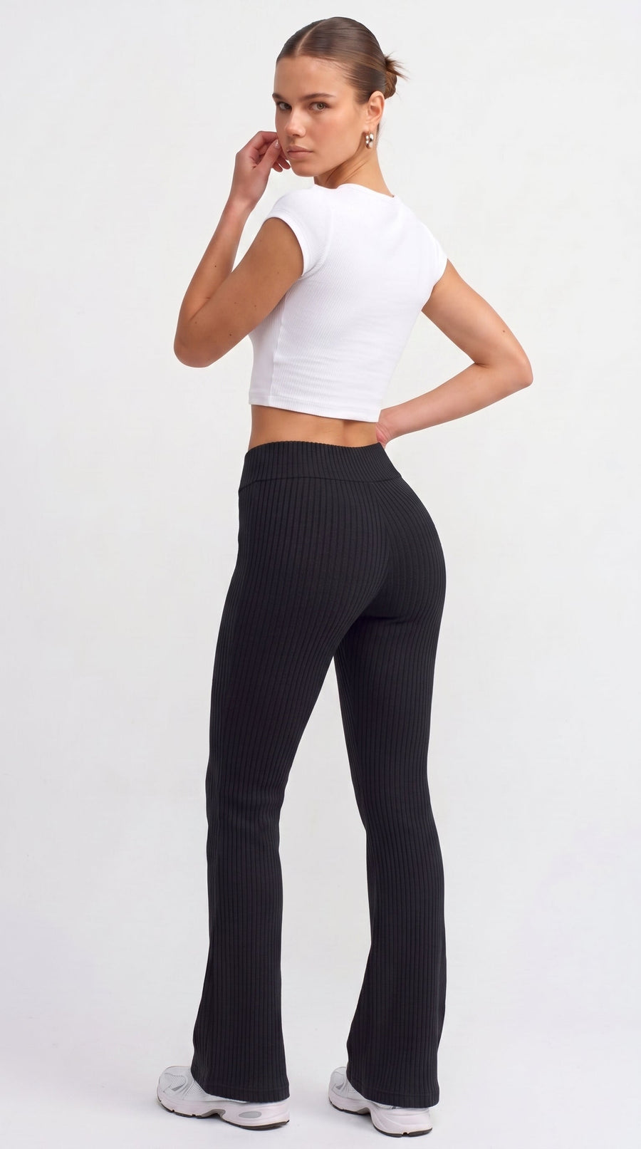 Black ribbed knit flared trousers