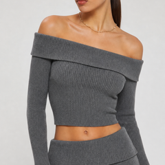 Grey two-piece off-shoulder knit top and flared trousers set