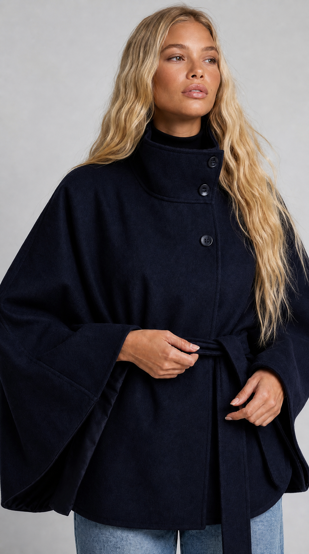 Navy wool-blend cape coat with high collar and tie belt